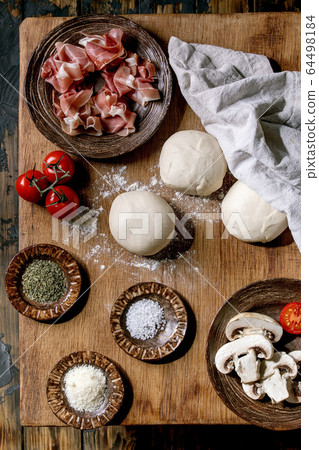 Dough for pizza 64498184