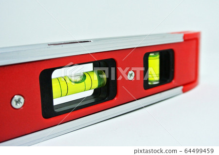 Spirit level tool for carpenter of contractor to determine object levels 64499459