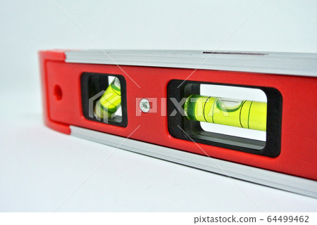 Spirit level tool for carpenter of contractor to determine object levels Spirit level tool for carpenter of contractor to determine object levels 64499462