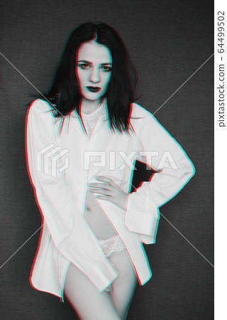 black and white portrait of a young girl in a shirt with a glitch effect black and white portrait of a young girl in a shirt with a glitch effect 64499502