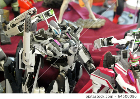 Selected focused on fictional character action figure from Japanese popular animated series Macross. Small scale model made from plastic. Selected focused on fictional character action figure from Japanese popular animated series Macross. Small scale model made from plastic. 64500086