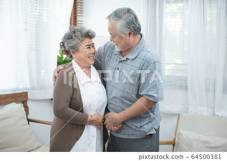 Portrait of elderly senior asian couple happy together at home. 64500381