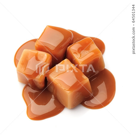 Caramel with candy isolated on white backgrounds. Caramel with candy isolated on white backgrounds. 64501344