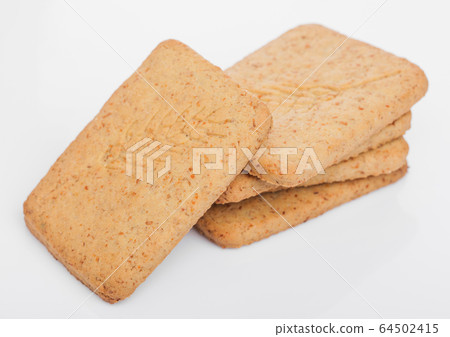 Stack of square organic crispy wheat and five Stack of square organic crispy wheat and five 64502415