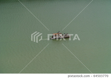 Russia. Krasnodar region. Pleasure boat Champagne on the picturesque lake Abrau in the vicinity of Novorossiysk. Russia. Krasnodar region. Pleasure boat Champagne on the picturesque lake Abrau in the vicinity of Novorossiysk. 64503770