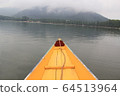 walked a colored boat on Dal Lake in Srinagar. India 64513964