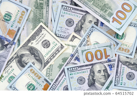 Top view of one hundred dollar banknotes made Top view of one hundred dollar banknotes made 64515702