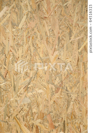 Pressed wooden OSB panel background. Vertical Pressed wooden OSB panel background. Vertical 64516315