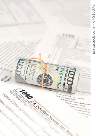 1040 Individual income tax return form with roll 1040 Individual income tax return form with roll 64516376