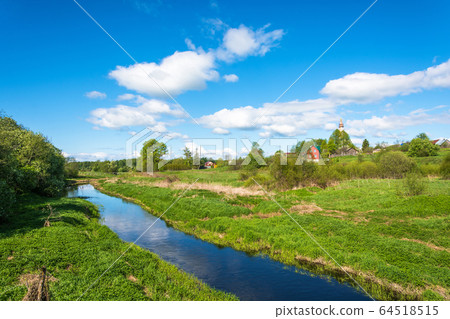 Panorama of the village of Mikhailovskoye in a 64518515