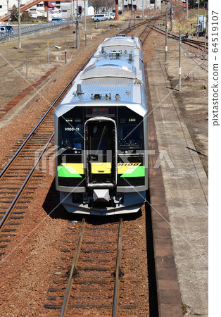We photograph scenery of ordinary train departing and arriving at JR Yoichi station in spring Hokkaido 64519107