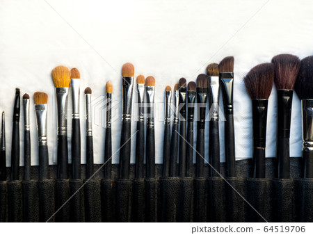 Make-up brushes arranged in rows For use as a Make-up brushes arranged in rows For use as a 64519706