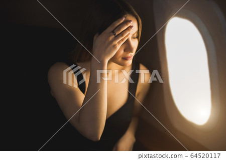 Attractive woman in private jet Attractive woman in private jet 64520117