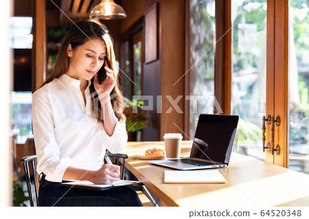 Asian Woman work from home 64520348