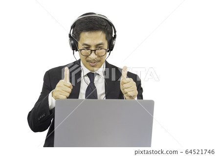 Businessman successful with thumps up while having video conference work from home concept Businessman successful with thumps up while having video conference work from home concept 64521746