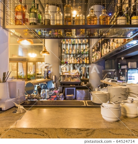 Clean dishes and view on bar counter in restaurant interior 64524714