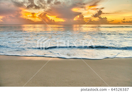 Beautiful sunset at Seychelles beach Beautiful sunset at Seychelles beach 64526387