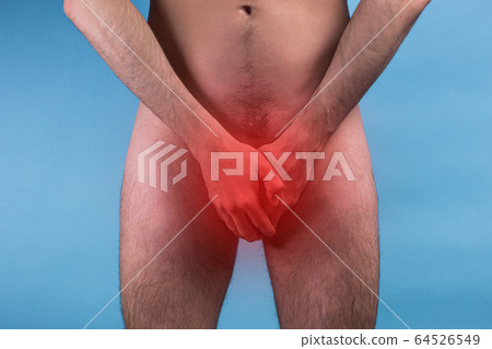 Man Covering His Crotch. the concept of male illness. prostate cancer. impotence. Man Covering His Crotch. the concept of male illness. prostate cancer. impotence. 64526549