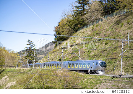Seibu Limited Express running in Chichibu 64528312