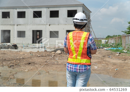 Asian women worker and engineer on building site Asian women worker and engineer on building site 64531269