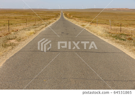 asphalt road in steppe, Inner Mongolia asphalt road in steppe, Inner Mongolia 64531865