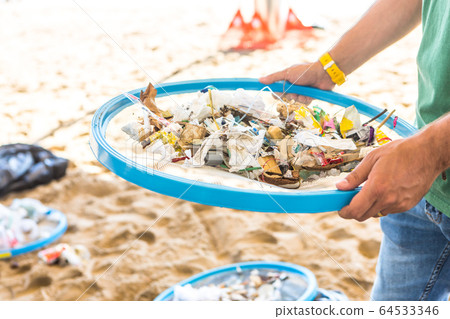 Beach Cleaning. Cleaning dirty beaches by the Beach Cleaning. Cleaning dirty beaches by the 64533346