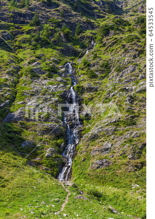 Alpine mountains near lake Riesachsee in Austria 64533545