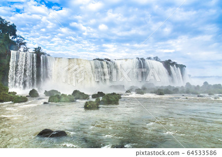 Tourists at Iguassu Falls at Iguassu National Tourists at Iguassu Falls at Iguassu National 64533586