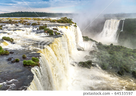 Tourists at Iguassu Falls at Iguassu National 64533597
