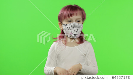 Little girl in medical face mask. Isolation. World pandemic COVID-19 coronavirus Little girl in medical face mask. Isolation. World pandemic COVID-19 coronavirus 64537178