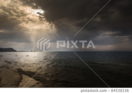 Dramatic sky over sea Dramatic sky over sea 64538136