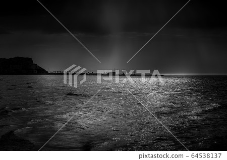 Dramatic sky over sea 64538137