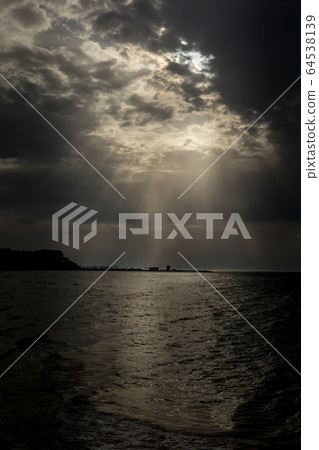 Dramatic sky over sea 64538139