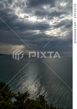 Thunderstorm over the sea 64538150
