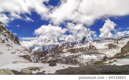View of Himalayan mountains and sky from Cho La Pass, 5,420 metres, Nepal. 64538663