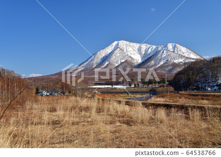Shooting scenery of Mt.Shiribetsu with remaining snow from Kyogoku-cho, Hokkaido Shooting scenery of Mt.Shiribetsu with remaining snow from Kyogoku-cho, Hokkaido 64538766