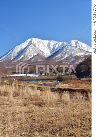 Shooting scenery of Mt.Shiribetsu with remaining snow from Kyogoku-cho, Hokkaido Shooting scenery of Mt.Shiribetsu with remaining snow from Kyogoku-cho, Hokkaido 64538770