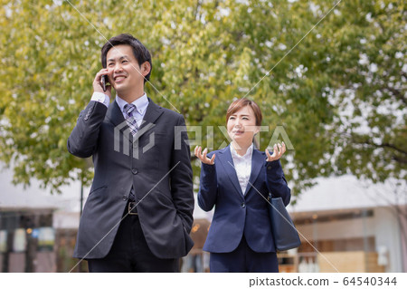 Company employee going around 64540344