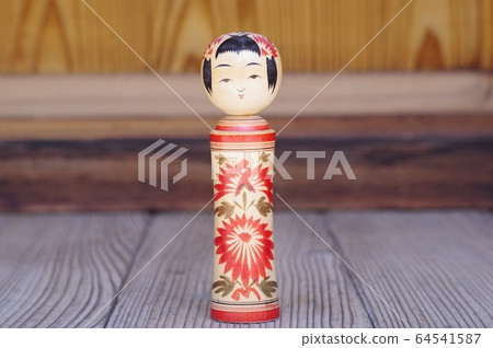 Naruko Kokeshi doll on the porch Naruko Kokeshi doll on the porch 64541587