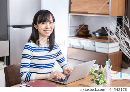 Remote work house woman 64542178