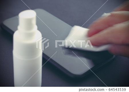 Disinfect and wipe mobile phones to prevent infection 64543539