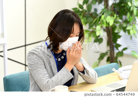 A woman in a mask 64544749