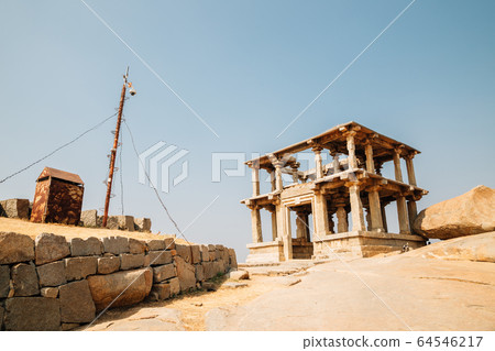 Hemakuta Hill Temple, ancient ruins in Hampi, India Hemakuta Hill Temple, ancient ruins in Hampi, India 64546217