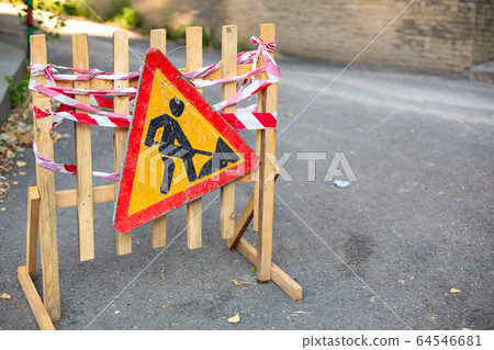 Road repair. Warning signs about repair work of a 64546681