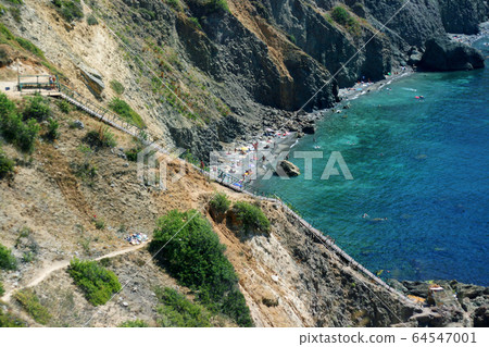 The landscape of the rocky shore of the Black Sea. The landscape of the rocky shore of the Black Sea. 64547001