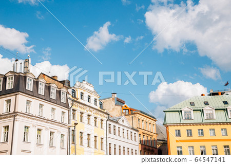Dome Square colorful buildings with blue sky in Riga, Latvia 64547141