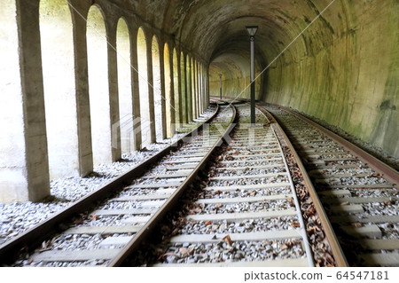 View of the railway tracks in the tunnel View of the railway tracks in the tunnel 64547181