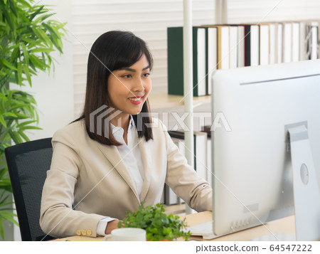 Women working with computer in the office Women working with computer in the office 64547222
