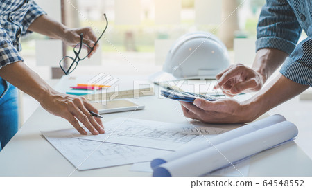 engineer Hand Drawing Plan On Blue Print with engineer Hand Drawing Plan On Blue Print with 64548552