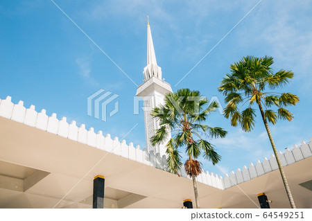 Masjid Negara mosque and palm trees in Kuala Lumpur, Malaysia Masjid Negara mosque and palm trees in Kuala Lumpur, Malaysia 64549251